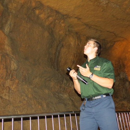 Photo of a tour guide in the cave