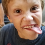 Kid with tongue out