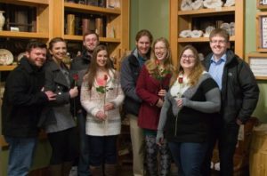 Line of couples with roses in the Cave of the Mounds Gift Shop
