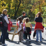 Photo of tour guide with scouting troop at a Wisconsin Destination