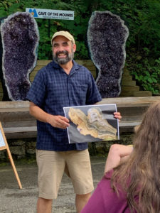 Photo of Dr. Richard Slaughter talking at a lecture at Cave of the Mounds.