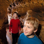 Photo of Kids in the Meanders of the Cave closerup