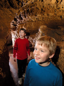 Photo of Kids in the Meanders of the Cave closerup