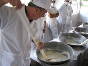 Man making cheese