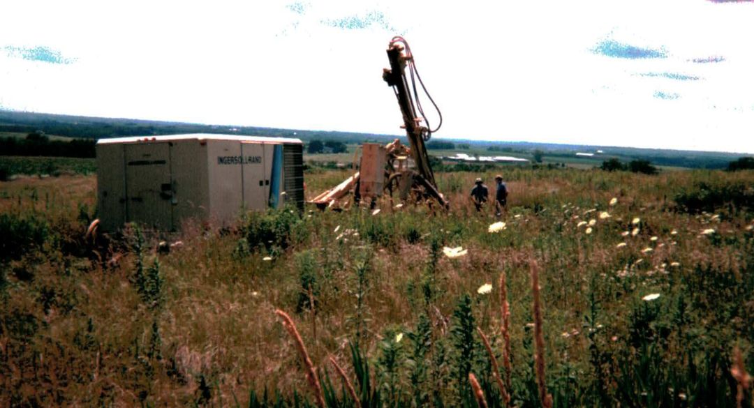 Large drill in a field next to Cave of the Mounds