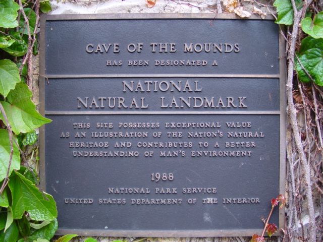 A plaque dedicated to Cave of the Mounds for it's National Natural Landmark status.