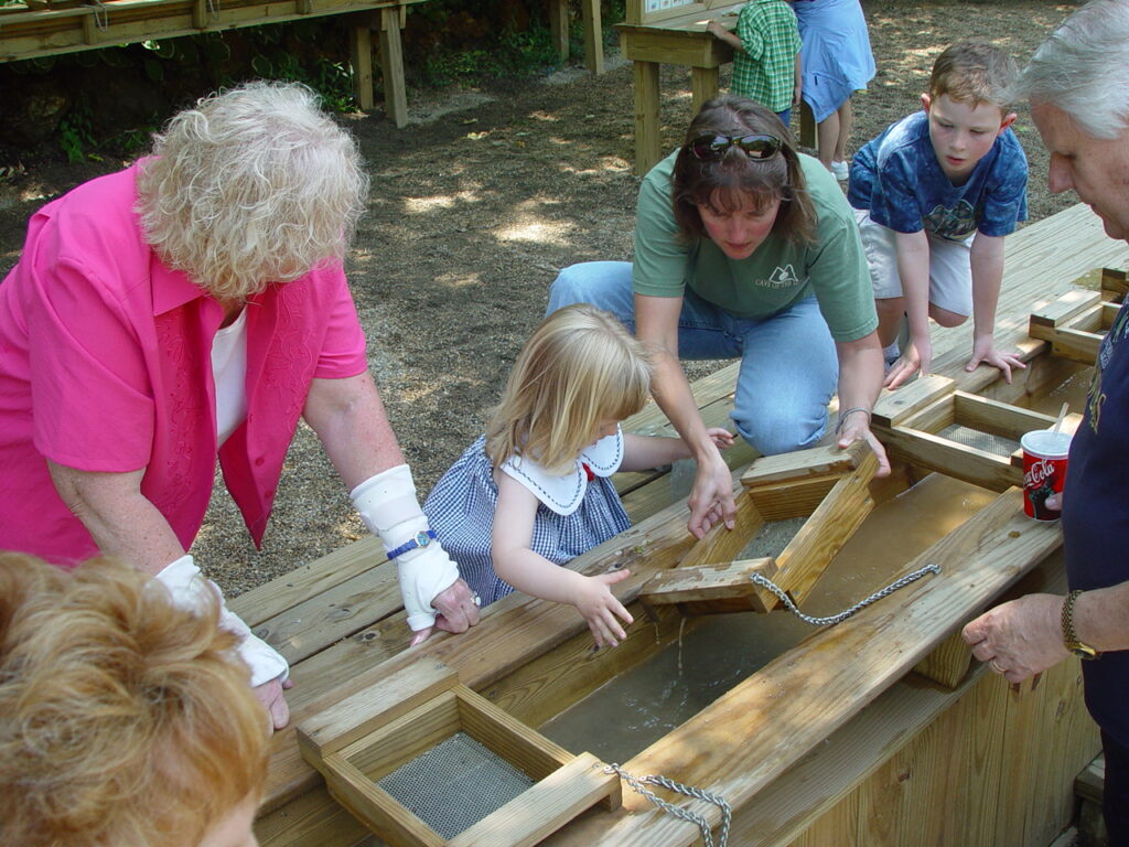 A family has fun at Top Wisconsin Destination Cave of the Mounds at their Gemstone Mine