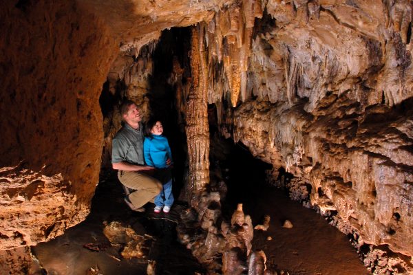 Photo of Column Room with people inside the cave at this must-see place in Wisconsin​