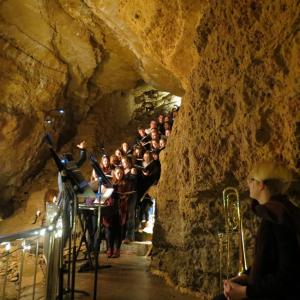 Photo of Choir singing in Cave of the Mounds
