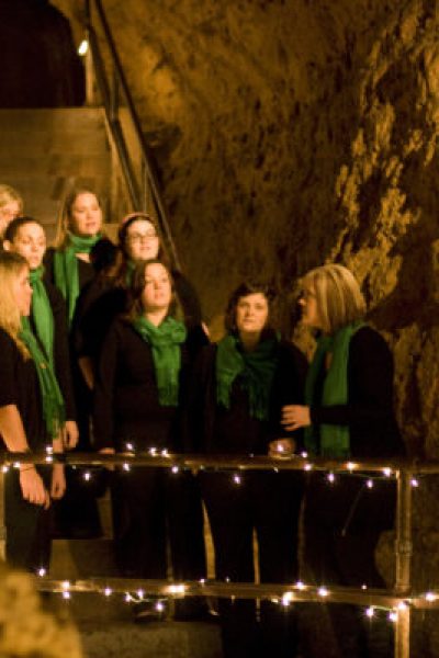 Greentones caroling in the Cave of the Mounds