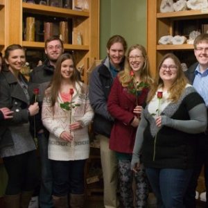 Line of couples with roses in the Cave of the Mounds Gift Shop